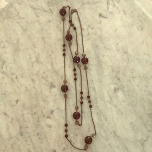 Long continuous necklace.